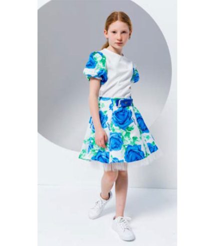 White Blouse with blue floral skirt
